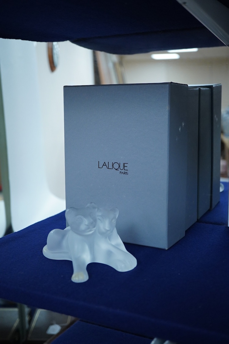 A Lalique ‘ Tambwee’ model of two lion cubs (boxed), 12cm wide